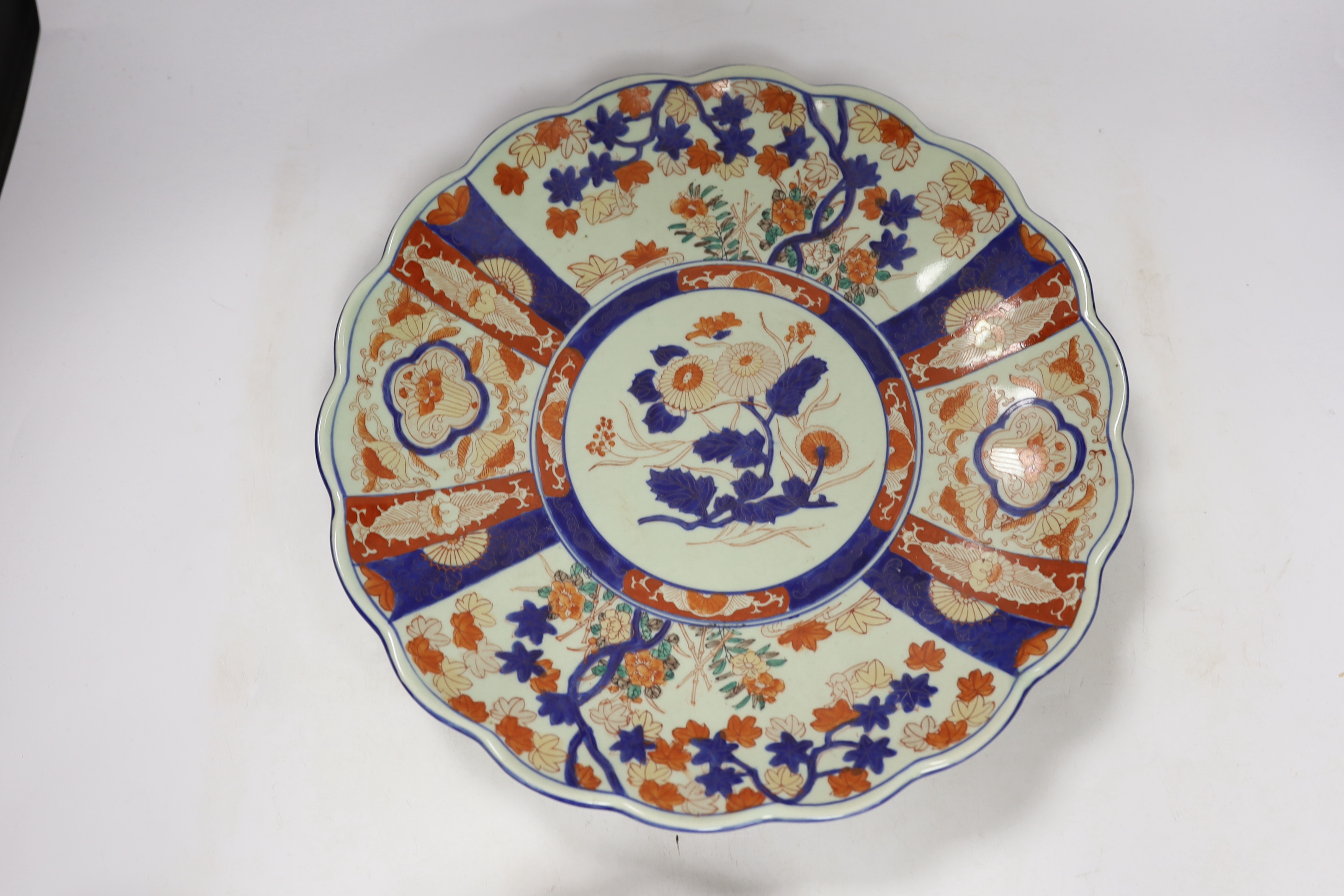 A group of Imari wares comprising bowl, charger and three dishes, largest 37cm in diameter